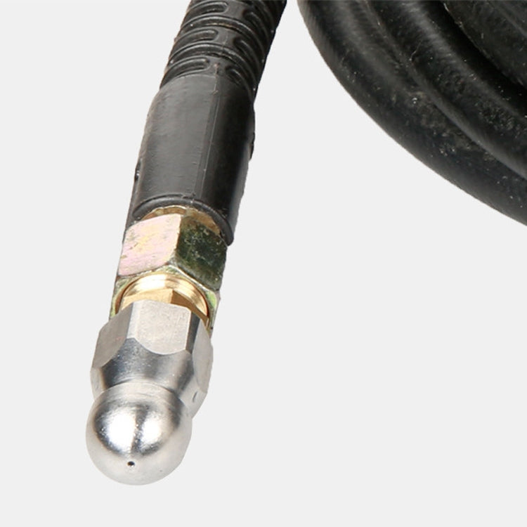Close-up of black hose end with gold coupling and rounded metal connector