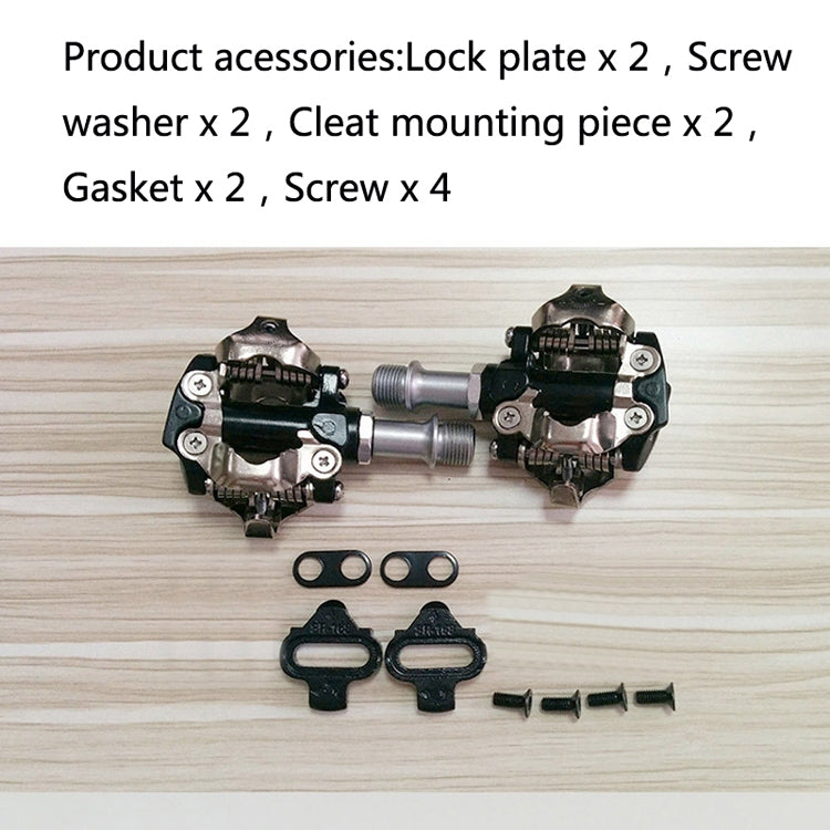 Bike pedal cleat hardware kit with cleats, screws, and washers shown on table