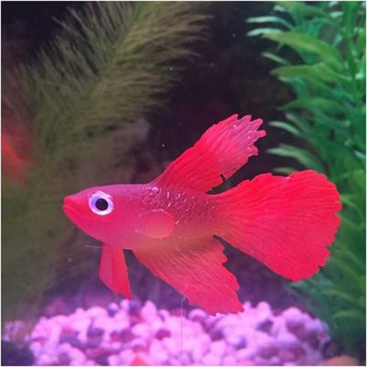 Red betta-style fish decoration with flowing fins and large round eyes.