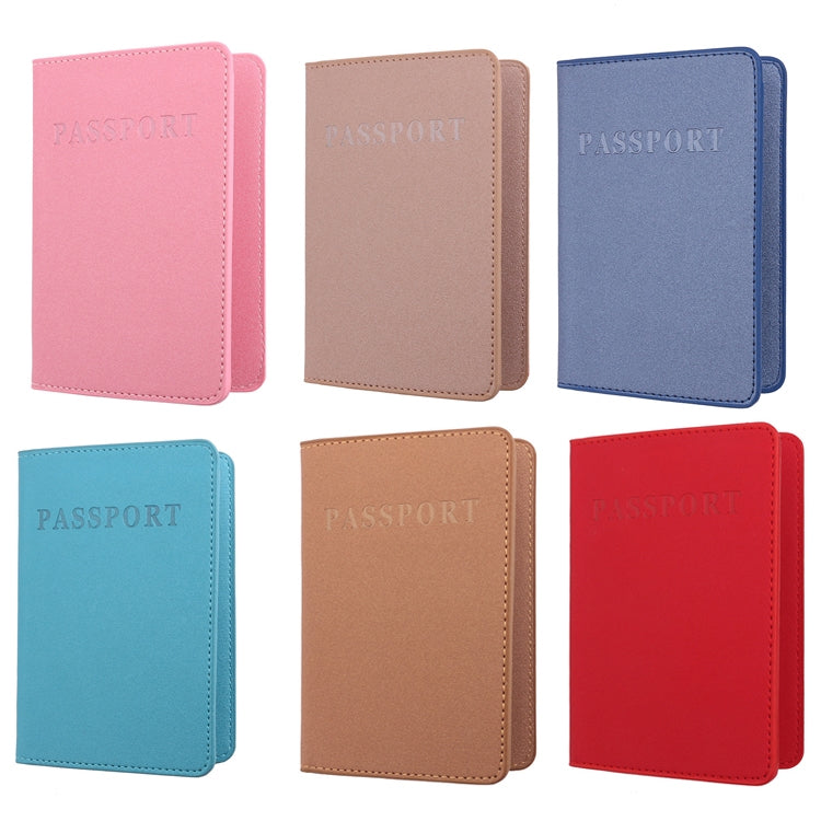 Passport card holders in pink, khaki, blue, sky blue, and red with 'PASSPORT' print