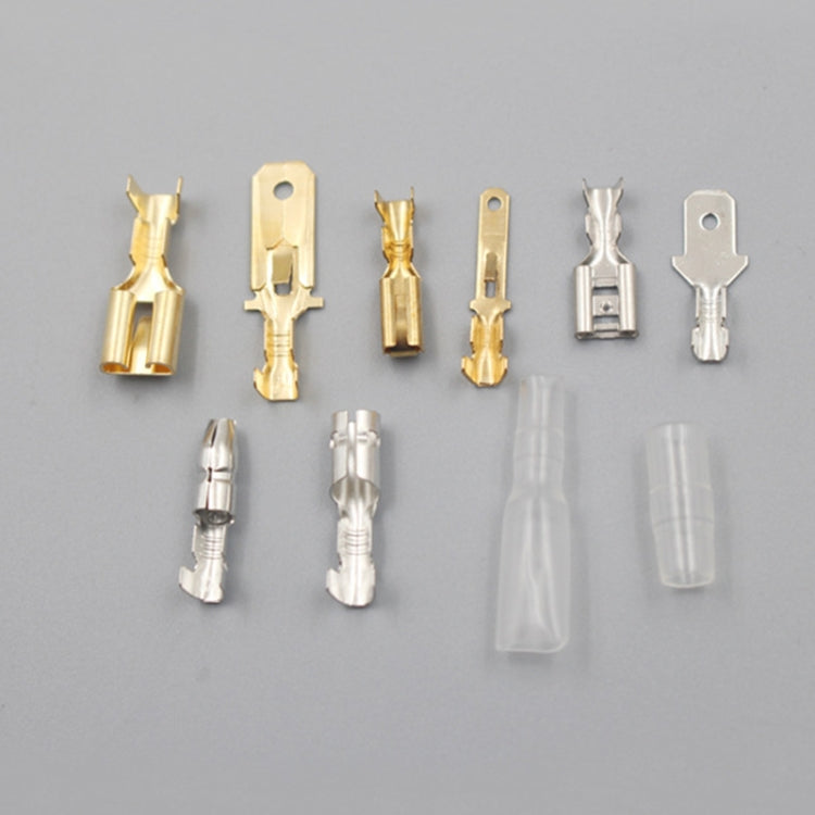 Gold and silver crimp wire spade terminals with clear protective sleeves