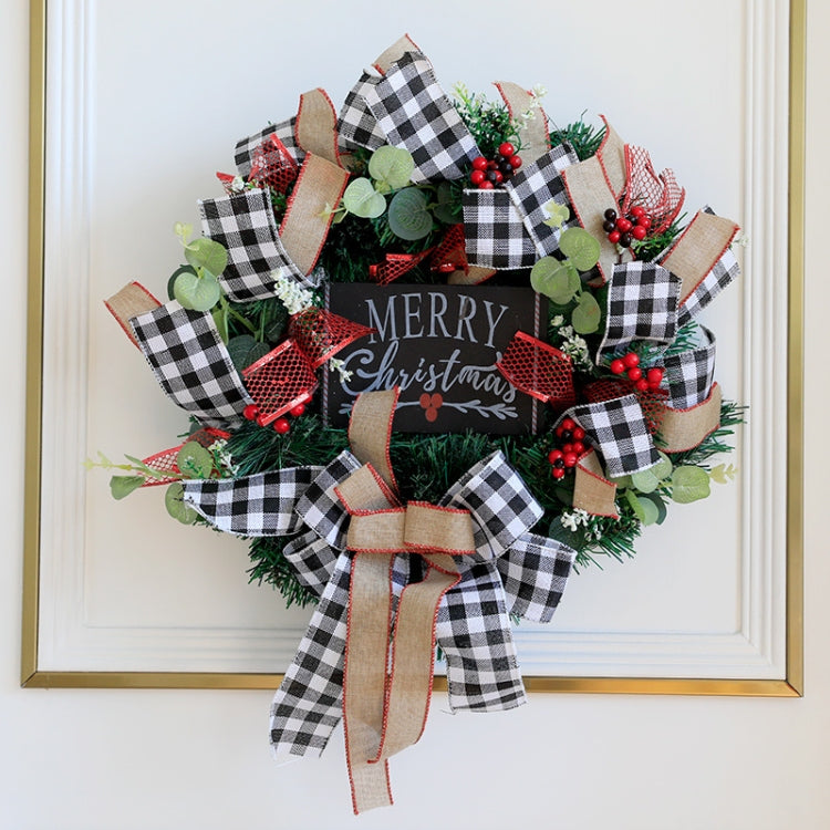 Plaid Christmas wreath with 'Merry Christmas' sign, pine branches, red berries and bows