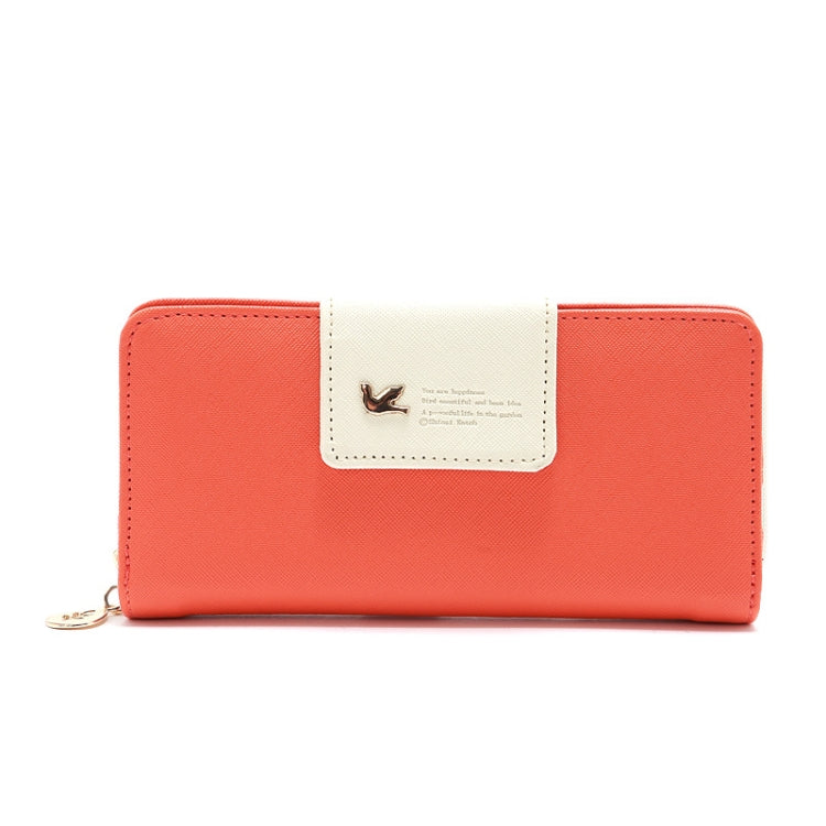 Long zipper wallet in coral red with cream center label and gold-tone logo.