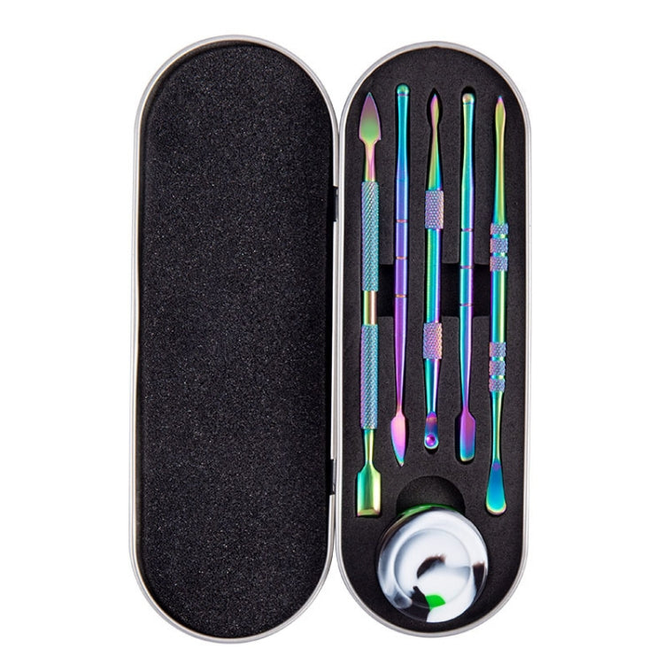 Nail art tool set open in oval case with black foam, teal/purple tools, and green accessory