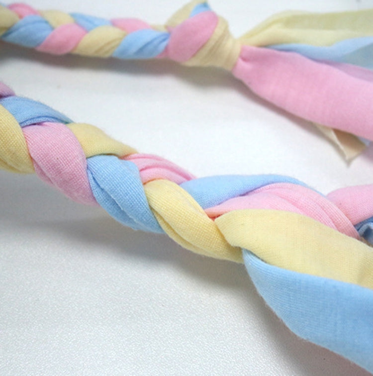 Twisted pastel cotton rope chew toy, braided fabric knots detail