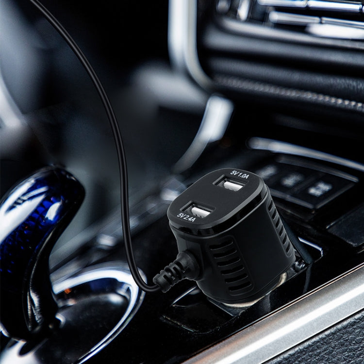 Dual USB car charger connected in car dashboard with charging cable