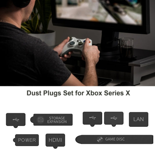 Xbox console dust plug set displayed with port label covers, black