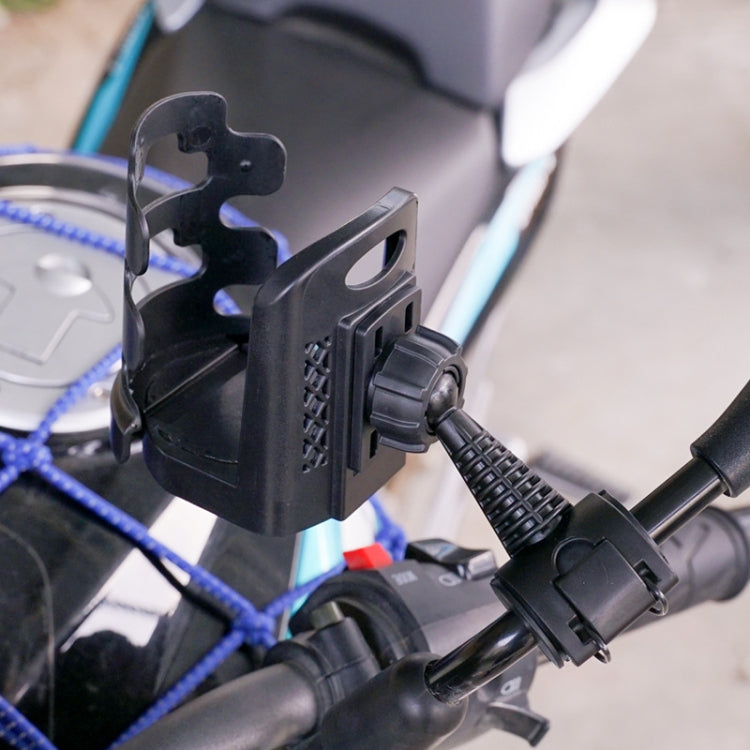 Motorcycle cup holder mount installed on handlebars with ribbed cup cradle