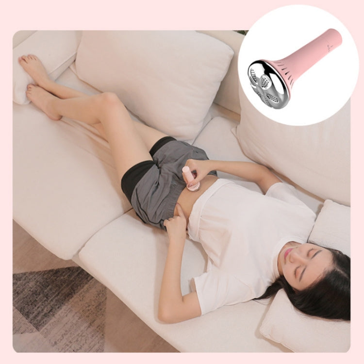 Light pink moxibustion device held on the body during massage