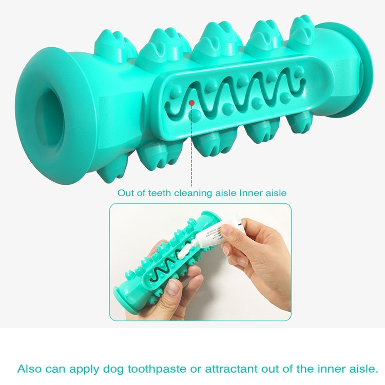 Teal-blue dog molar stick toothbrush with ridged front and spikes; shown held by hand