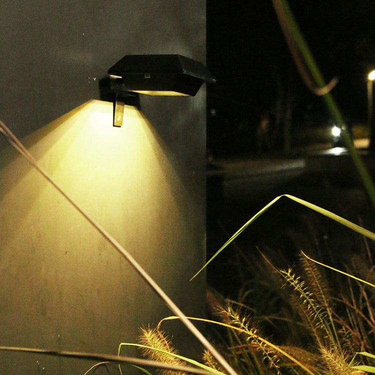 Black square solar LED outdoor railing/stair wall light emitting warm white light