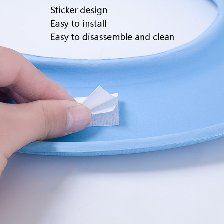 Blue EVA toilet seat washer ring with adhesive backing and hand pressing