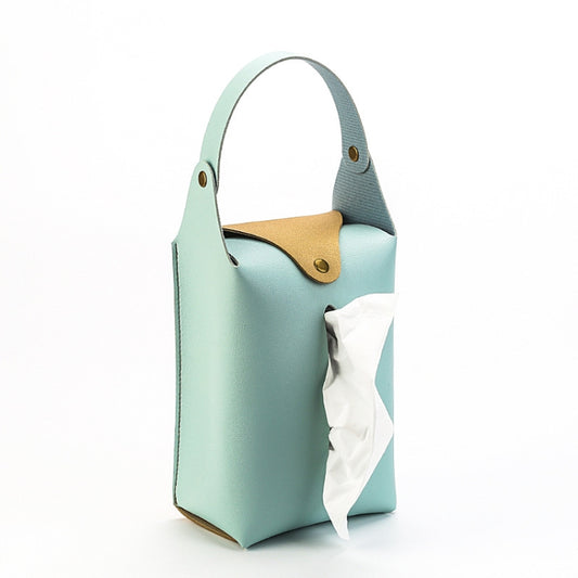 Light blue suspended paper towel bag with gold button strap and pull-through opening