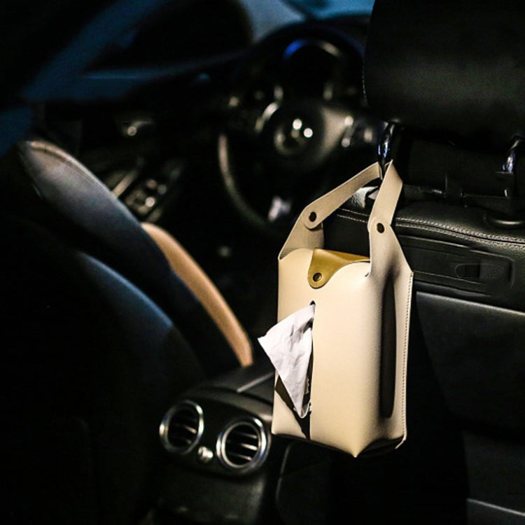 Off-white suspended paper towel bag hanging from car interior, with pull-through opening