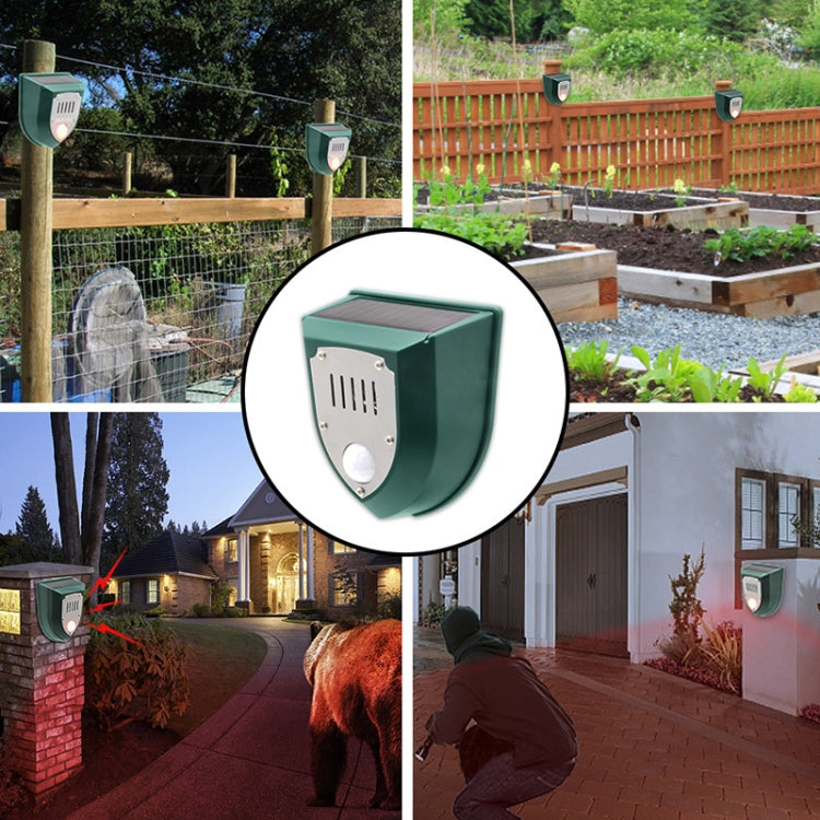 Solar animal alarm lamp installed outdoors on fence post, green shield sensor