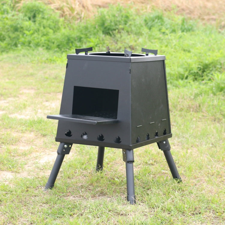 Portable folding wood stove barbecue with side vents and four legs, dark metal