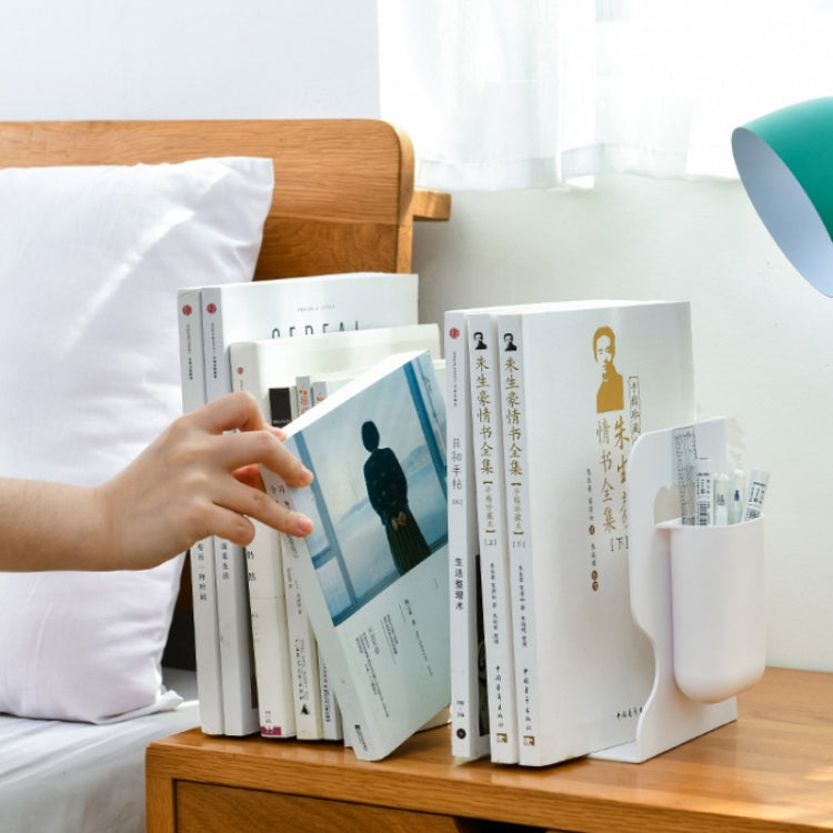 White folding book storage stand with pen cup, holding books on a table