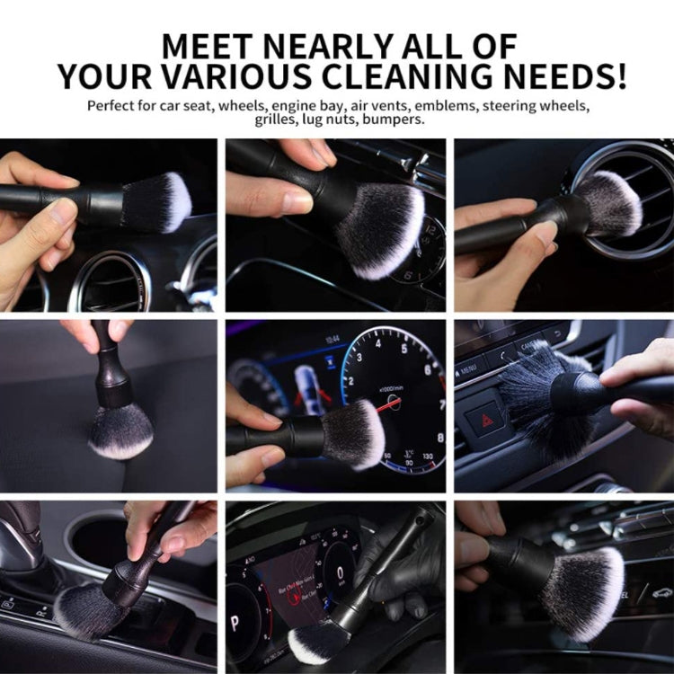 Car air conditioner outlet cleaning brushes shown on car controls, black handles with bristles