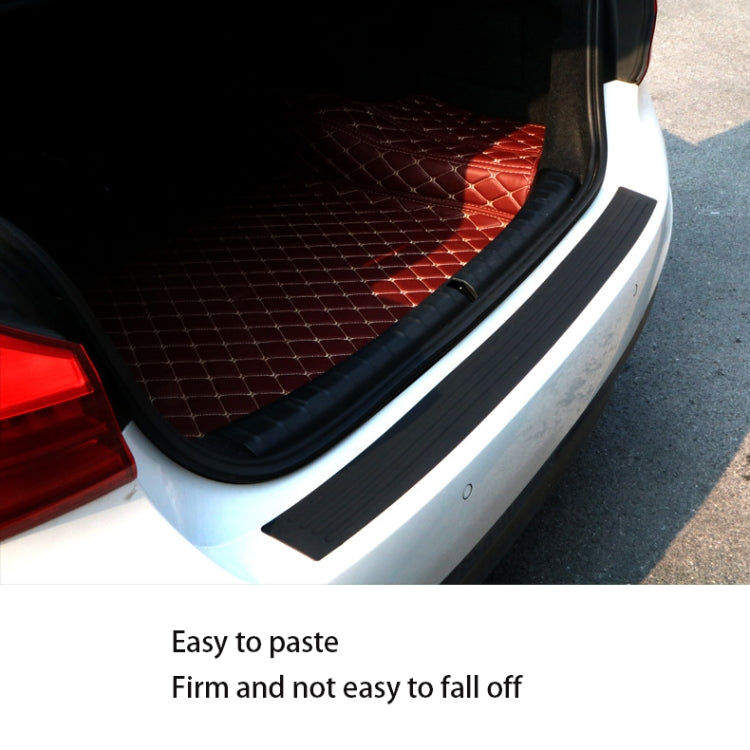 Car trunk threshold anti-collision strip installed along bumper edge, black rubber trim