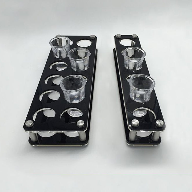 Black acrylic wine glass holders with round holes and silver cup accents