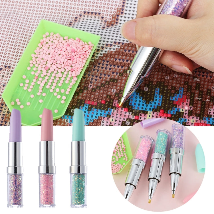 Diamond painting pen set with glitter tips: mint, pink, purple; hand holding one pen