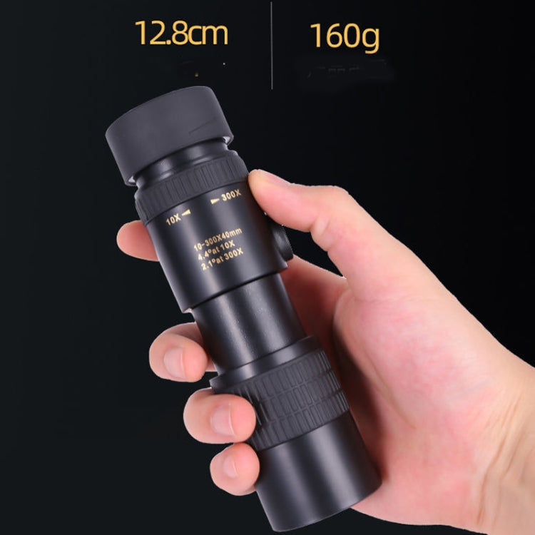 Handheld black monocular telescope, about 12.8 cm long and 160 g.