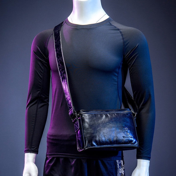 Black leather crossbody messenger bag worn with adjustable shoulder strap