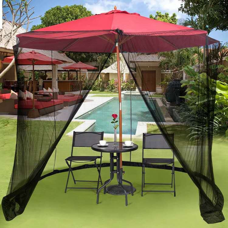 Outdoor parasol with mosquito net cover, red canopy and black mesh curtains