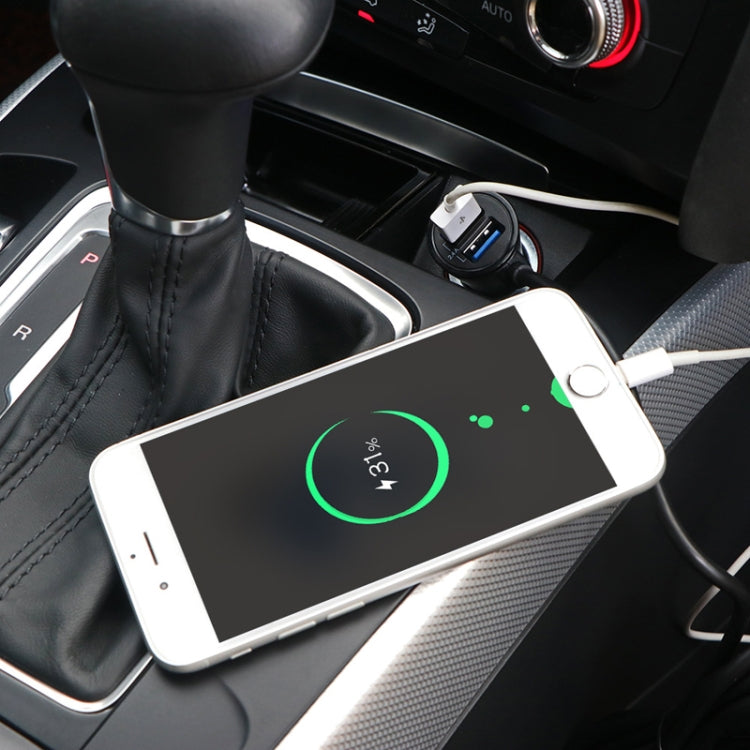 White back-seat car charger powering a smartphone via USB ports