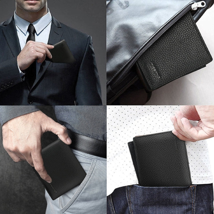 Black bifold wallet on person and in hand, slim profile with textured leather