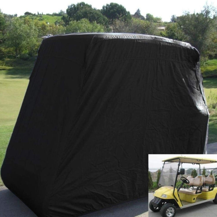 Black golf cart dust cover draped over cart with curved, fitted hood