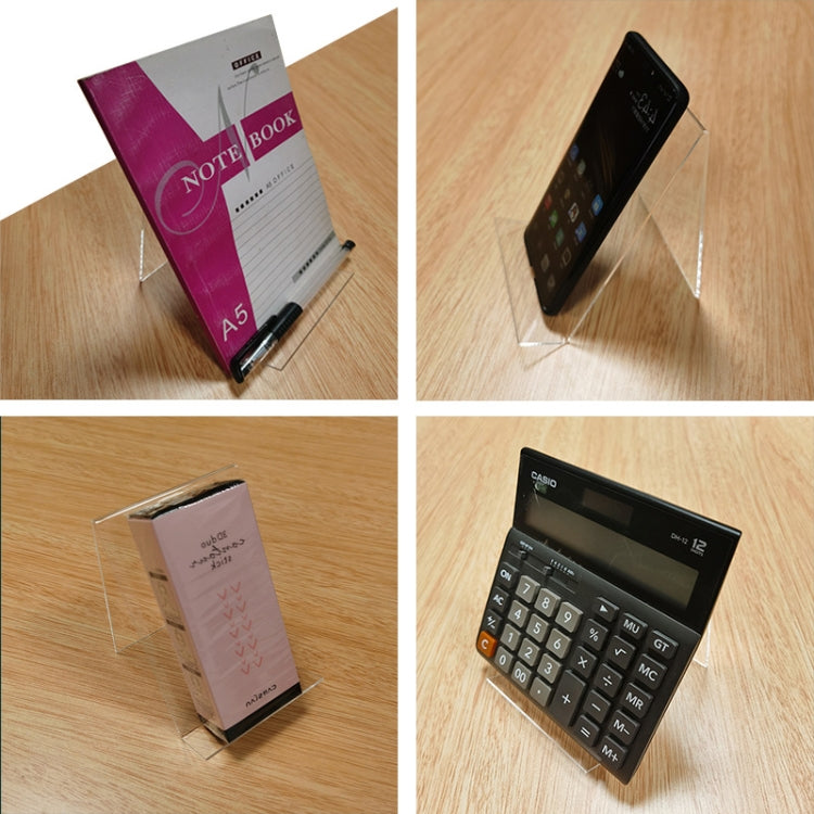 Transparent acrylic display stand holding a book on a clear base