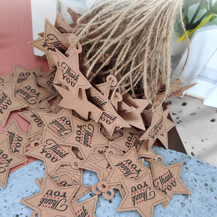 Close-up of kraft star hang tags with “Thank You” lettering and twine loops