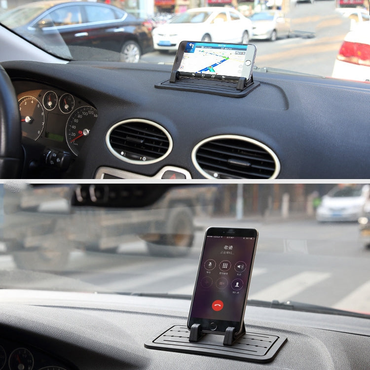 Car dashboard phone holder with clamp mount and phone screen in place