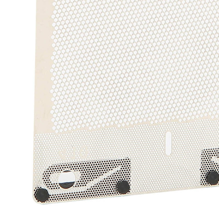 Close-up of beige shaver foil mesh with black edge and mounting slot