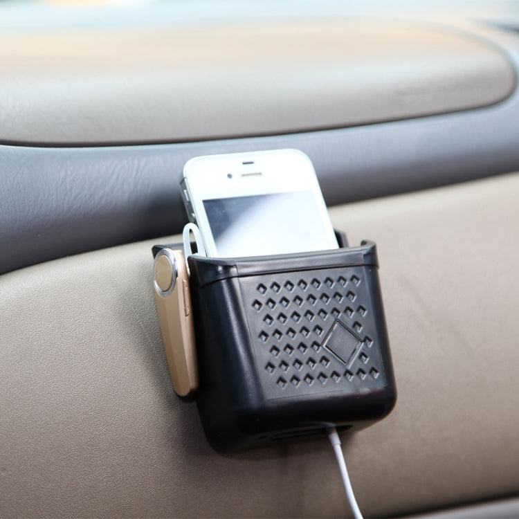 Black car phone holder with cigarette storage box gripping a smartphone