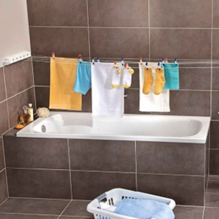 Retractable clothesline drying rack mounted over bathtub with hanging towels