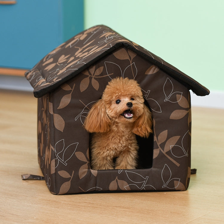 Brown leaf-print pet tent with front door opening; dog facing camera from inside