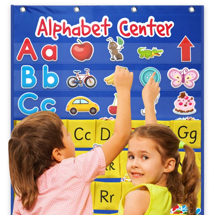 Child hands placing alphabet cards into a blue hanging pocket chart