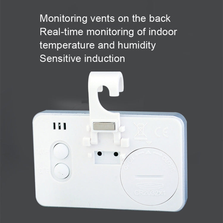 White mini digital thermometer back with hanging hook, vents, and circular battery cover
