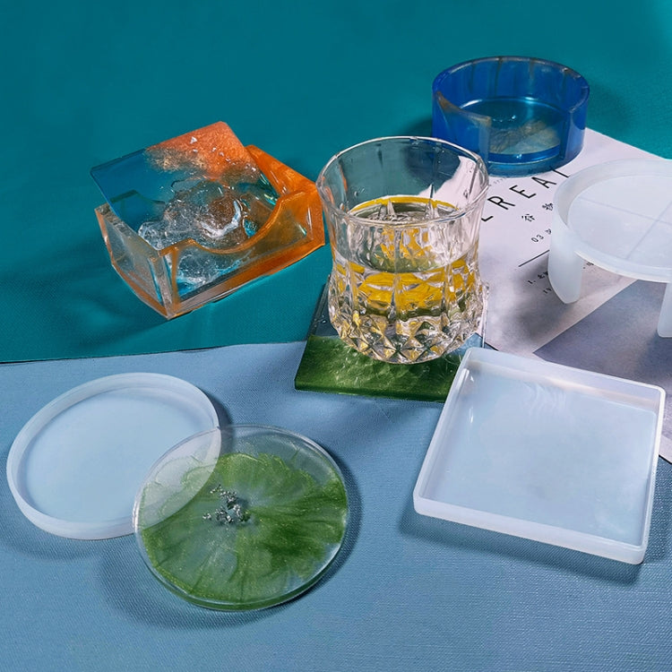 Silicone epoxy coaster box molds with square and round shapes, plus resin coasters