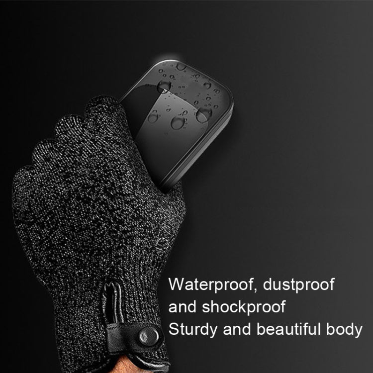 Wireless waterproof touch sensor doorbell with black casing, held in gloved hand