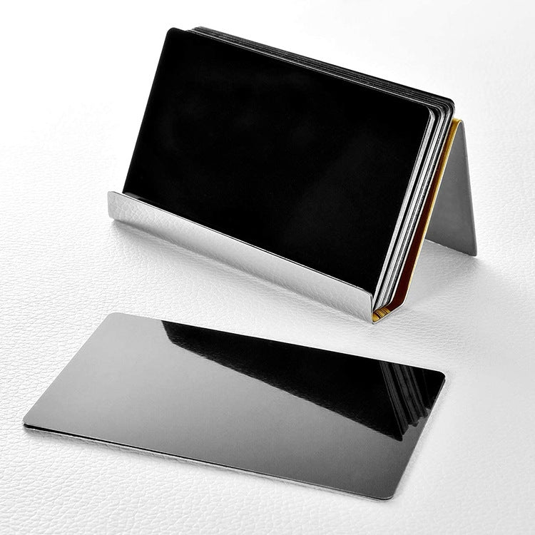 Silver mirrored desktop name card storage rack with black card insert.