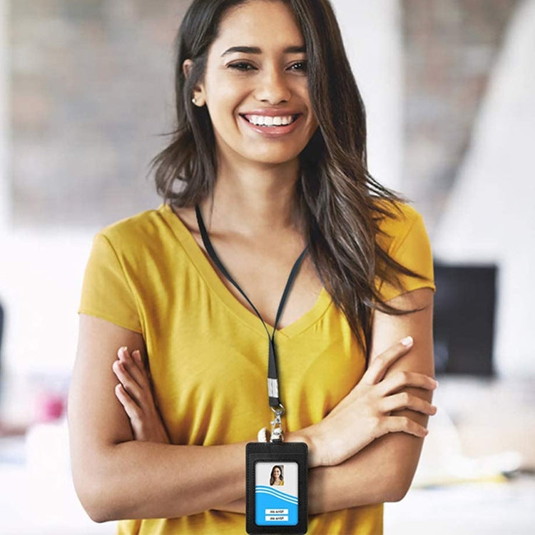 Woman wearing a black ID badge holder on a retractable neck lanyard, ID window shown