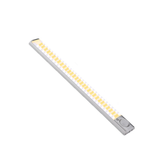 Slim LED wardrobe light bar with motion sensor, warm white illumination, silver housing