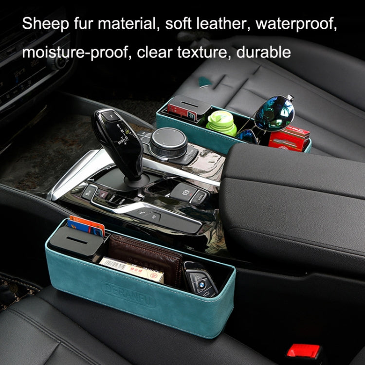 Teal car seat storage box on car seat with open-top tray holding small items