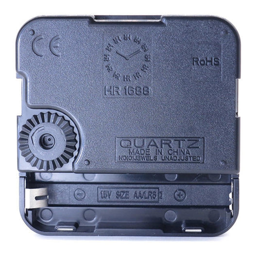 Quartz clock movement assembly with front gear wheel and dark metal cover