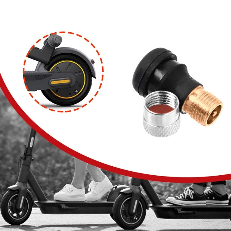 Vacuum tire nozzle adapter shown near scooter wheel for vacuuming dust from the tire