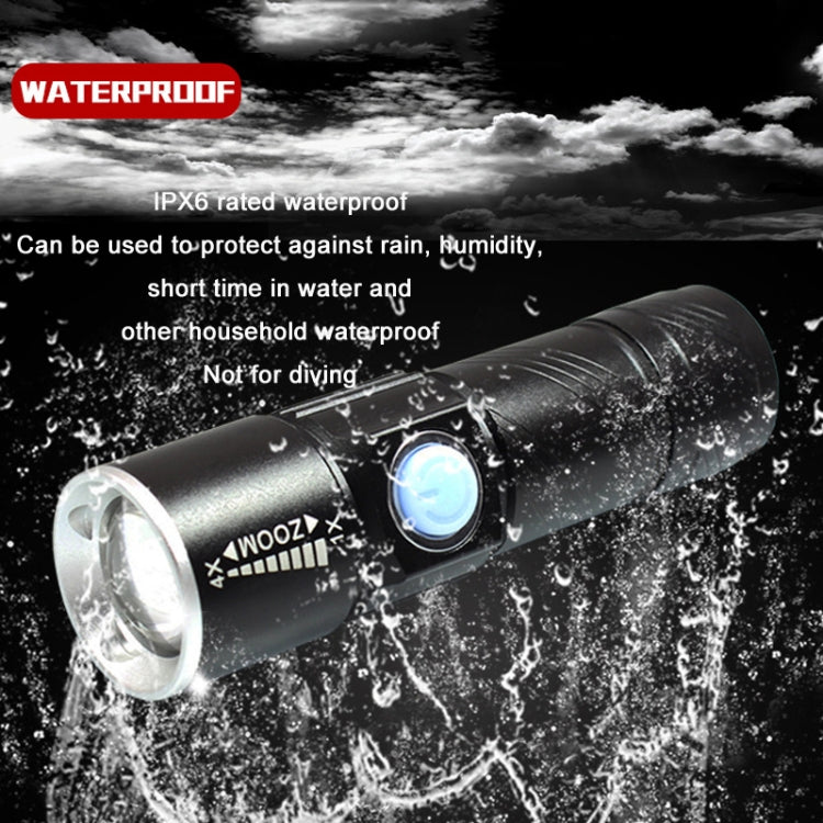 Waterproof black UV flashlight with silver lens, shown with water splash droplets