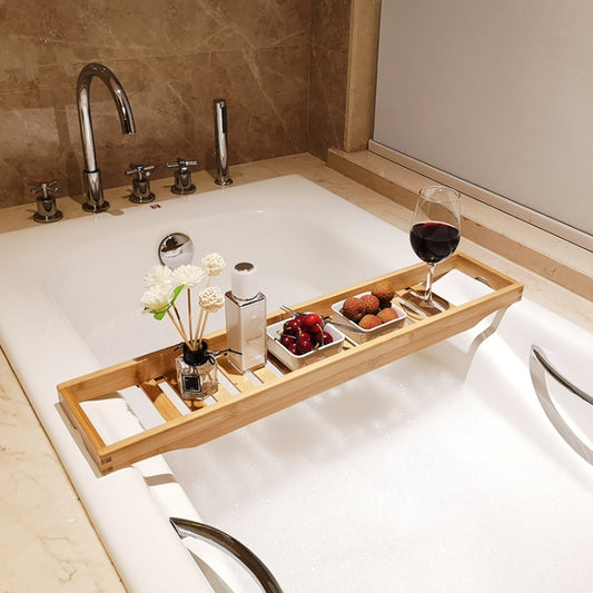 Bamboo bathtub shelf with non-slip slats and compartments for soap, flowers, and drinks